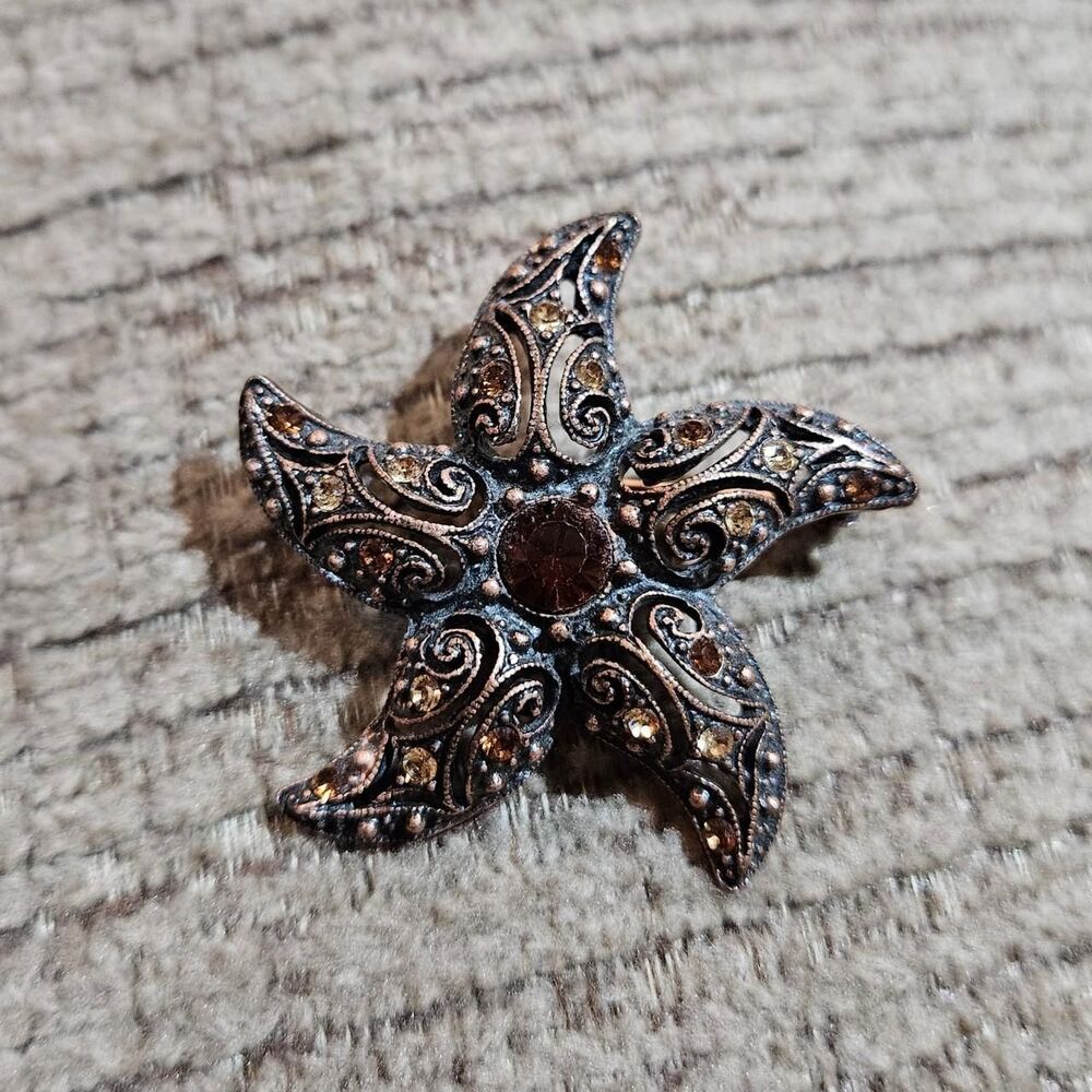 vintage whimsical brown star brooch
